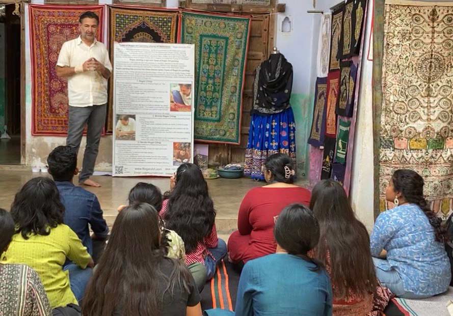 Ashish Kansara training women in Rogan art workshops